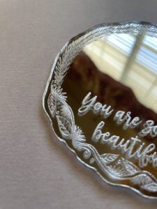 Laser cut and engraved mirrors